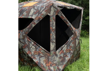 Image of Barronett Blinds Tag Out Hub Hunting Blind with blaze orange safety panels, Bloodtrail Woodland, 3-Person, TA350BT