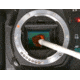 Use the cleaning stick to wipe away dirt and other particles on the sensor